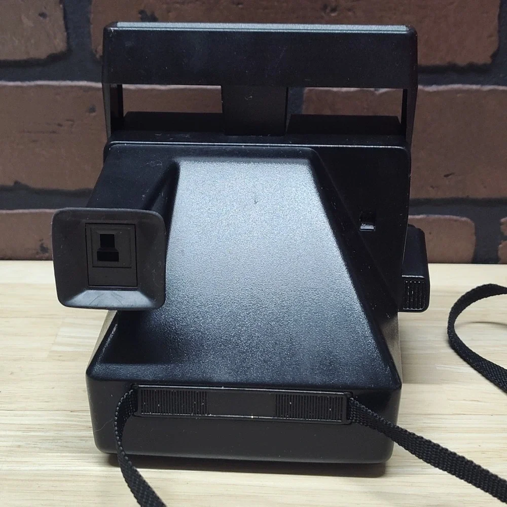 Polaroid please see